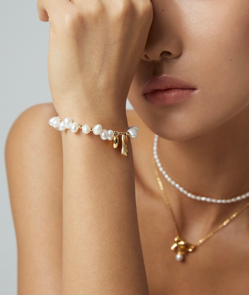 Elegant Pearl Whispers Bracelet